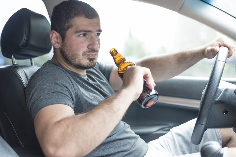 man-with-beer-driving-car.jpg